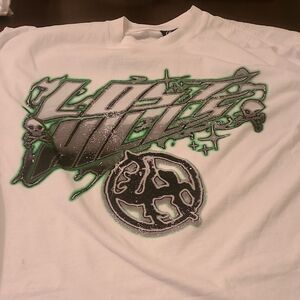 White Graphic Tee with Green and Black Design